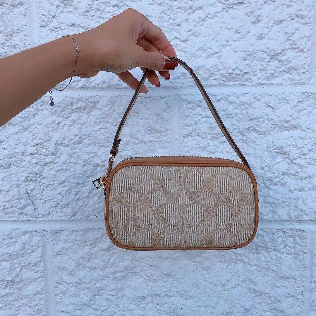 Coach CA718 Jamie Wristlet In Signature Canvas In Gold/Lt Khaki/Lt Saddle Coach CA718 Jamie Wristlet In Signature Canvas In Gold/Lt Khaki/Lt Saddle